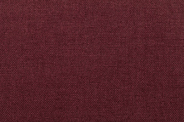 istock Dark red background from textile material. Fabric with natural texture. 655268858