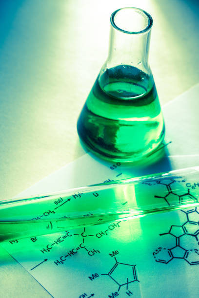 istock Chemical tubes with reaction formula 655272132