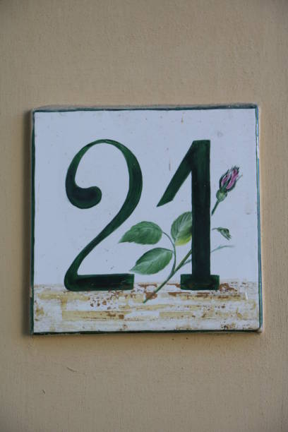 istock house number twenty one at stone wall 655299272