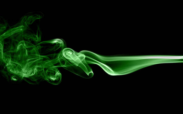 グリーンの煙に黒色の背景 - toxic substance smoke abstract green ストックフォトと画像