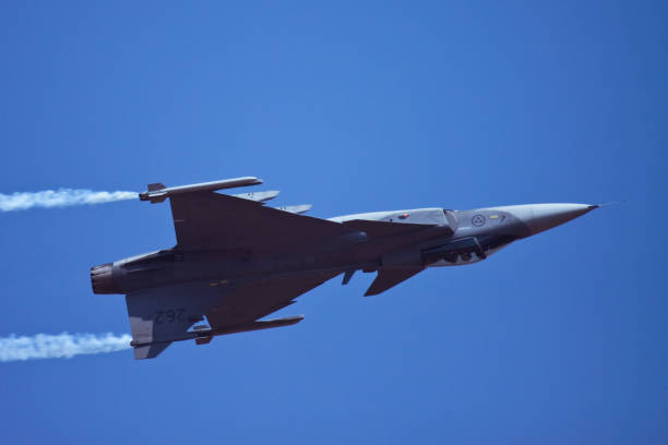 Saab JAS 39 Gripen, swedish made fighter jet, seen from below.