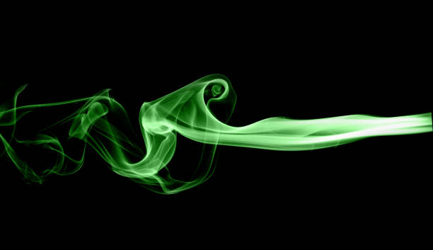 green smoke on black background - toxic substance smoke abstract green imagens e fotografias de stock