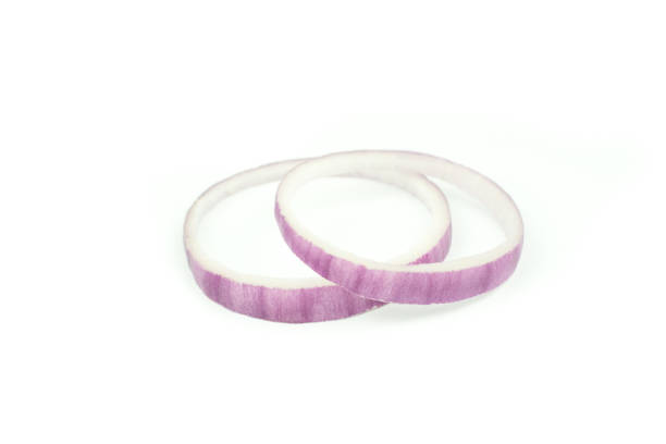 istock Sliced red onion rings isolated on white background 655327028