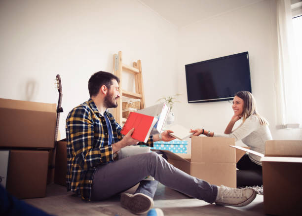 istock Young couple moving to a new house 655344952