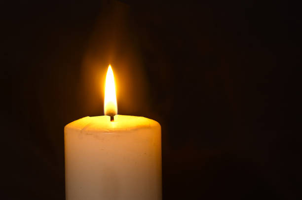 istock the flame of a burning candle 655346570