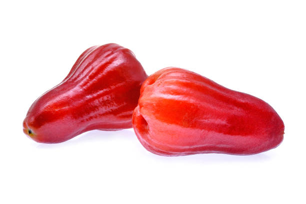 istock fresh red rose apples isolated on white background 655349332