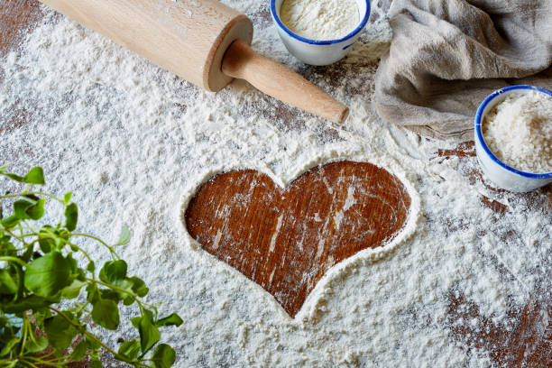 istock heart brushed in flour scene 655349972
