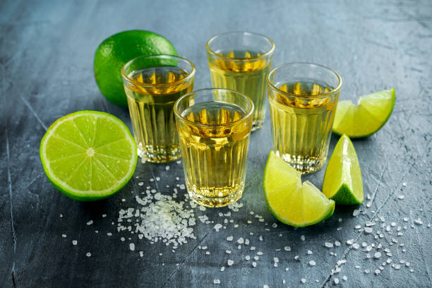istock Gold Tequila shots with lime and sea salt 655352876