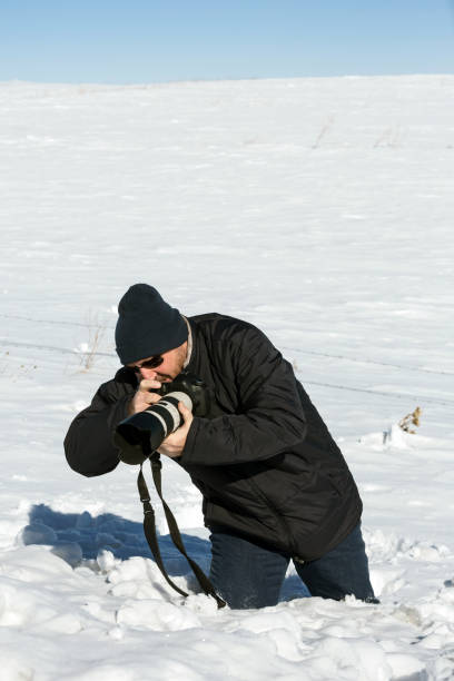 istock Photographer and Deep Snow at cold wild 655355976