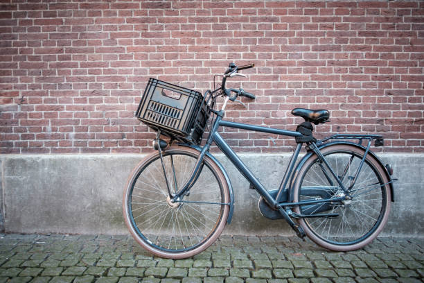 bike with plastic crate against the wall