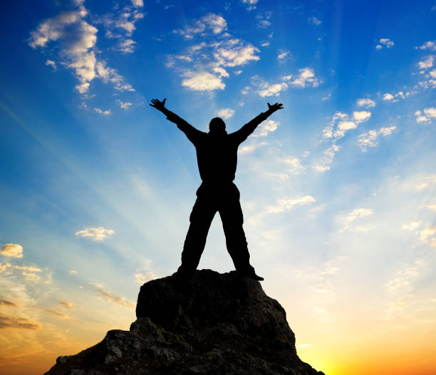 istock Silhouette of man and sunshine 655368272