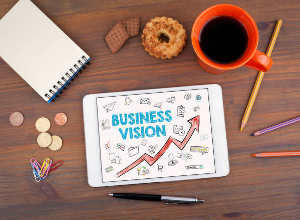 istock Business Vision Concept. Tablet on an old wooden table 655371692