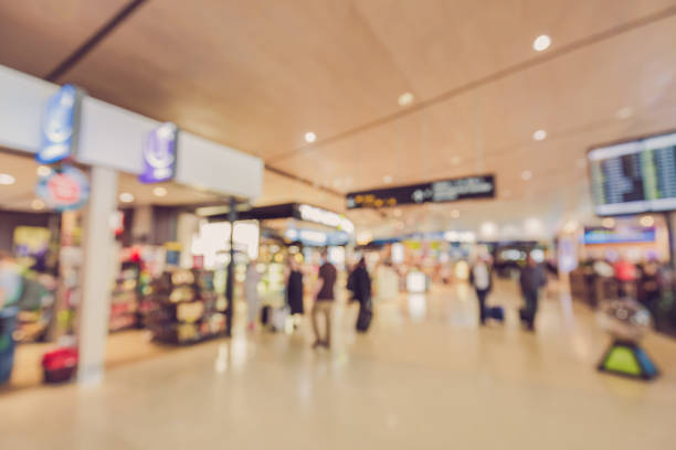 istock Blurred background : Traveler at airport terminal blur background with bokeh light 655374022