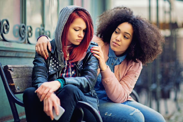 istock Girl is consoling her girlfriend after break up 655374408