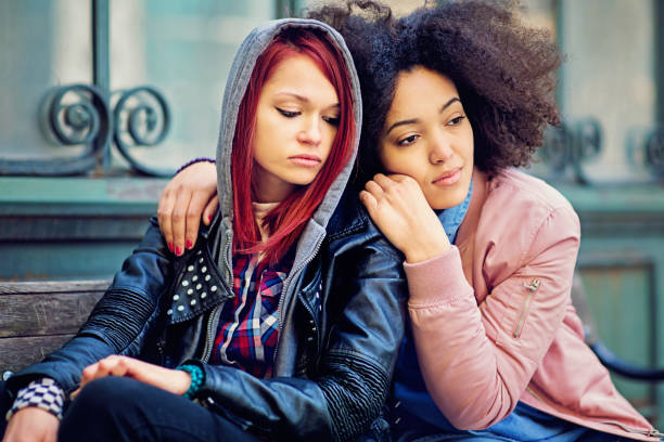 istock Girl is consoling her girlfriend after break up 655376962