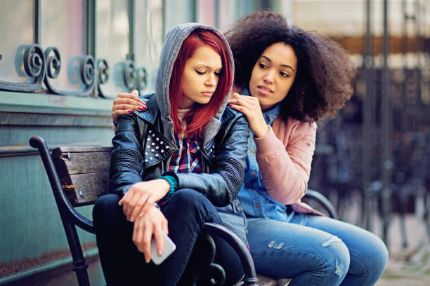 istock Girl is consoling her girlfriend after break up 655377240