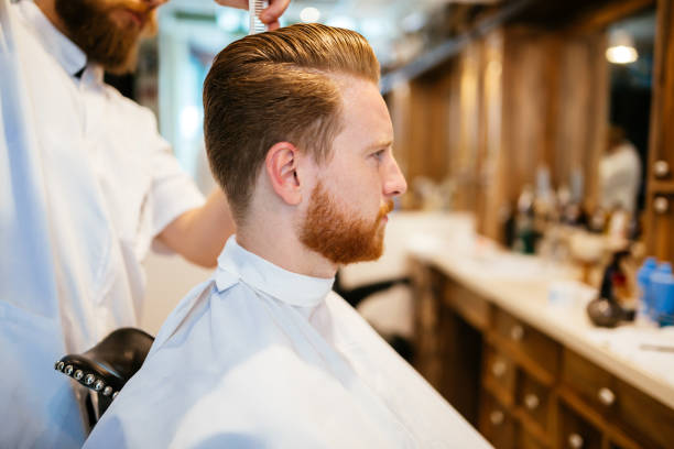 istock Hair mustache beard treatment in barber shop 655377802