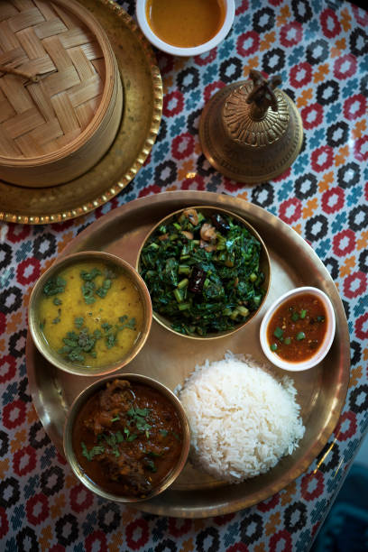 istock Traditional Nepalese food - thali (dal bhat) in a restaurant 655381736