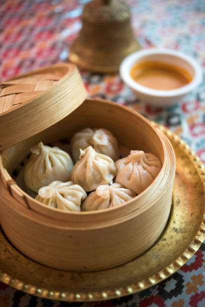 Momo, traditional Nepali dumplings Momo, traditional Nepali dumplings chinese dumpling photos stock pictures, royalty-free photos & images