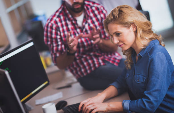 istock Corporate coworkers brainstorming in  software developement company 655384190