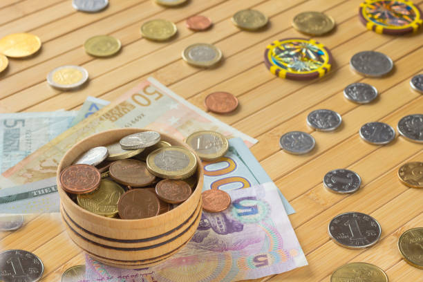 istock Currencies of different countries on  light brown background 655384502