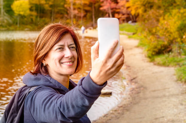 istock Woman Hiker Taking a Selfie 655388554