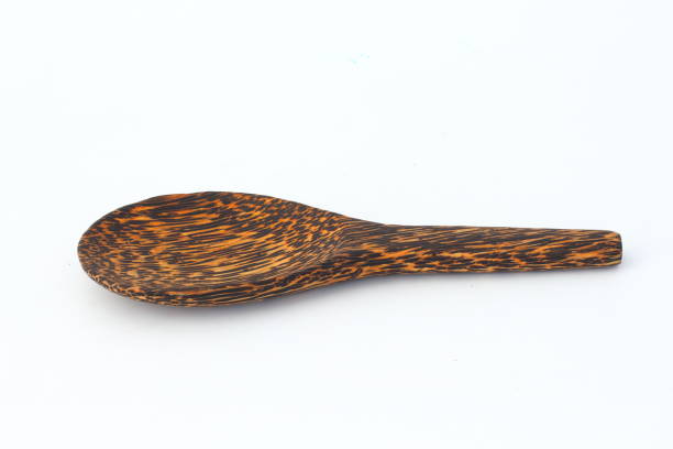 istock Wooden spoon with beautiful pattern on a white background. 655392280