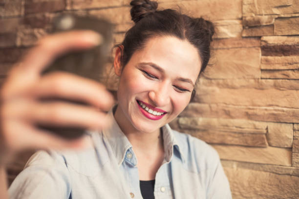 istock Girl by the wall 655394632