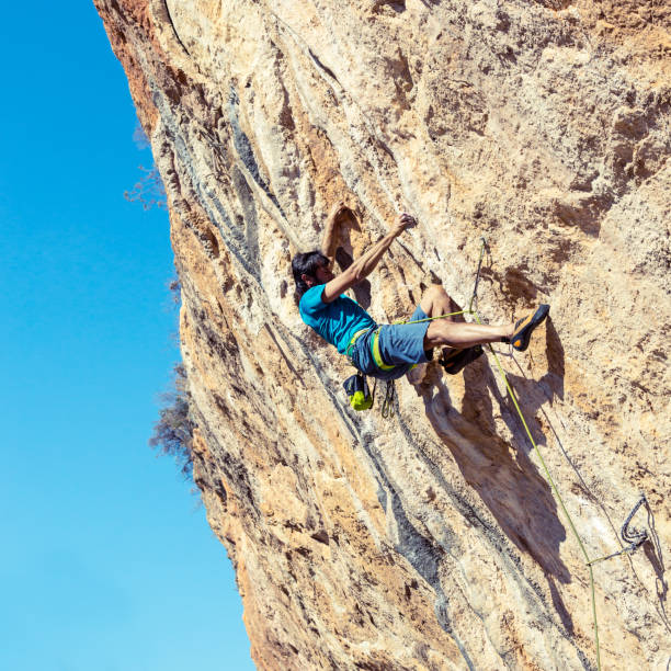 istock Male Rock Climber on high Wall 655413860