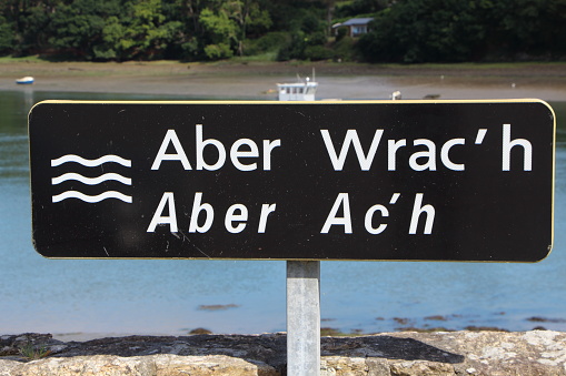 Road sign of l'Aber Wrac'h on a wall