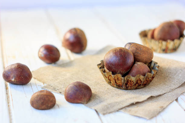 istock Heap of fresh chestnuts 655424318