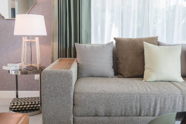 istock set of pillows on classic sofa in modern living room 655424950
