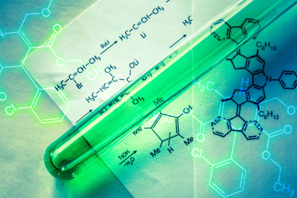 istock Chemical tube with reaction formula 655439464