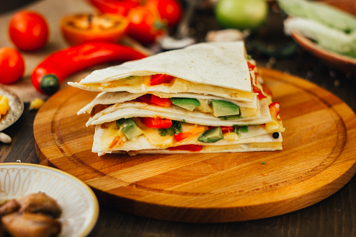 Nice vegetarian quesadilla with tortilla bread, beans, cheese and vegetables