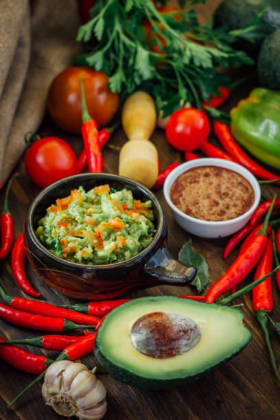 istock Guacamole and salsa - two hot mexican vegetarian dips. 655442196