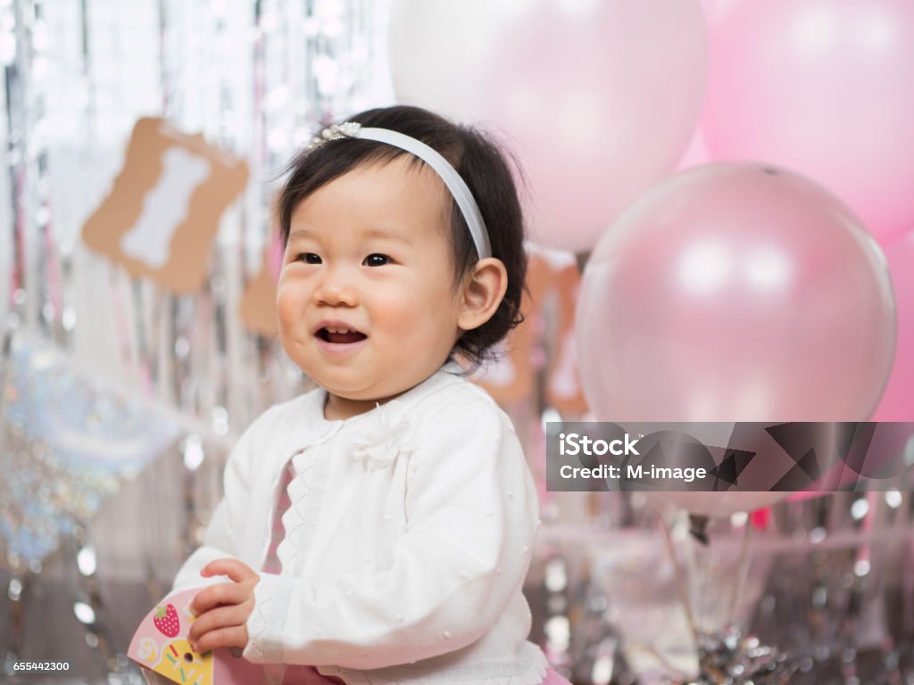 Babymädchen feiern ihren ersten Geburtstag - Lizenzfrei Kind Stock-Foto