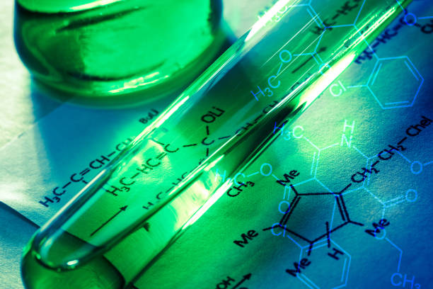 istock Chemical tube with reaction formula 655442352