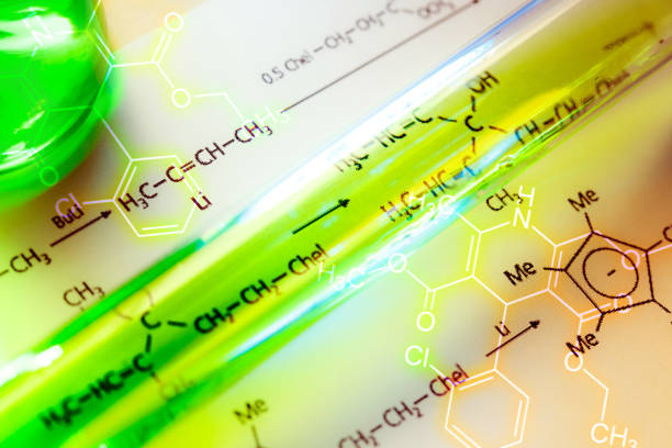 istock Chemical tube with reaction formula 655443974