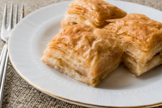 istock Turkish Baklava sutlu nuriye with milk and hazelnuts. 655446166