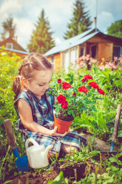istock Happy little girl in garden 655449092
