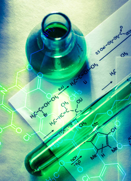istock Chemical tube with reaction formula 655449190