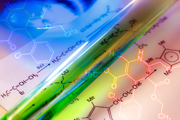istock Chemical tube with reaction formula 655449602
