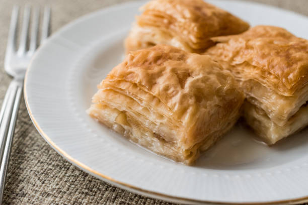 istock Turkish Baklava sutlu nuriye with milk and hazelnuts. 655450290