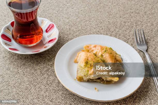 Turkish Baklava Sobiyet With Pistachio And Tea Stock Photo - Download Image Now - Arab Culture, Bakery, Baklava