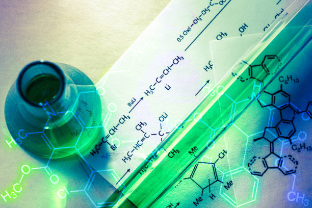 istock Chemical tube with reaction formula 655453146