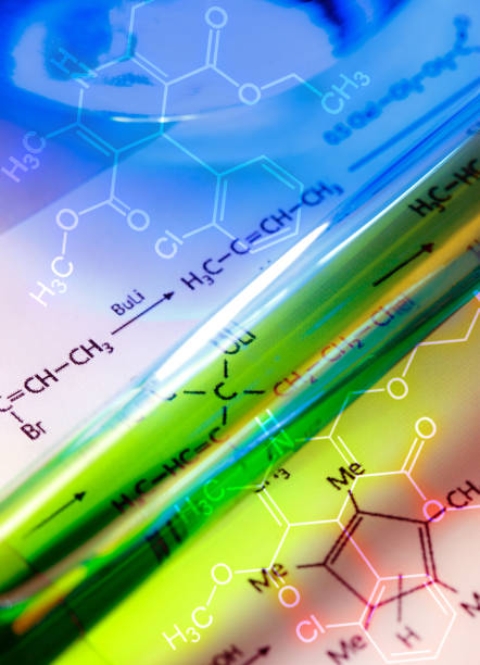 istock Chemical tube with reaction formula 655458728