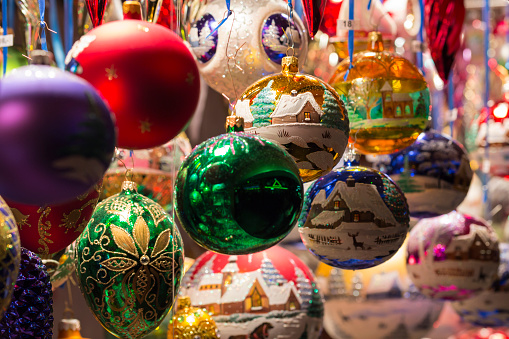 Beautiful handmade christmas tree balls and decorations displayed at a christmas market stand