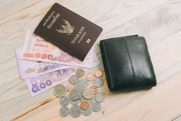 istock Thailand passport and Thai money 655469304