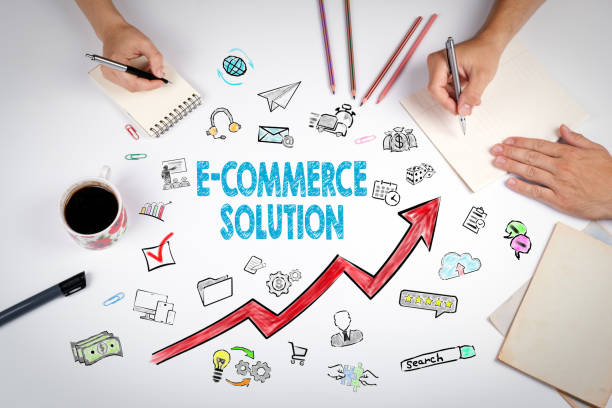 istock E-Commerce Solution, Business Concept. The meeting at the white office table 655499746