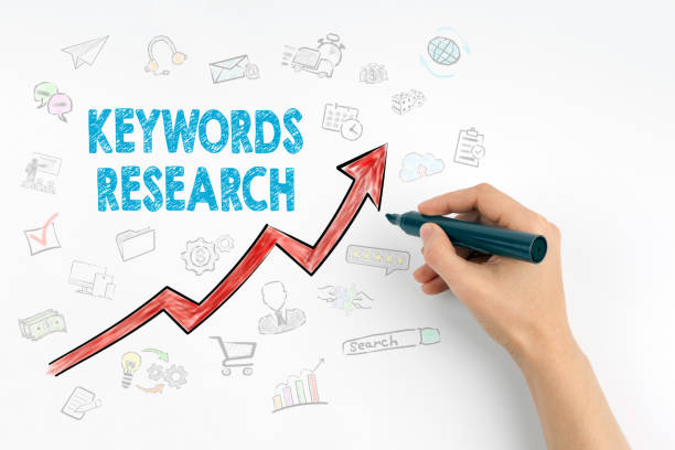 istock Hand with marker writing - Keywords Research Business Concept 655500146